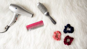 Grey Hair Blower Near Pink Hair Combs and Scrunchies
